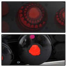 Load image into Gallery viewer, Xtune Tail Lights Chevy Camaro (93-02) [Euro Style] Black Clear or Black Smoked Alternate Image