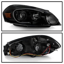 Load image into Gallery viewer, Xtune Headlights Chevy Impala (2006-2016) [Light Bar DRL] Black Smoked w/ Amber Corner Lights Alternate Image