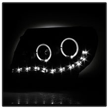 Load image into Gallery viewer, Xtune Projector Headlights Toyota Tacoma (05-11) [Black or Chrome] w/ Halo LED or LED Light Bar - Halo LED / Black Alternate Image