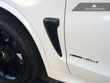 Load image into Gallery viewer, Autotecknic Fender Trim Set BMW X5 F15 (14-18) Glazing Black / Stealth Black / Carbon Fiber - Glazing Black / w/ BMW Emblems Alternate Image
