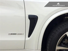 Load image into Gallery viewer, Autotecknic Fender Trim Set BMW X5 F15 (14-18) Glazing Black / Stealth Black / Carbon Fiber - Glazing Black / w/ BMW Emblems Alternate Image