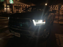 Load image into Gallery viewer, AlphaRex Dual LED Projector Headlights Dodge Ram 1500 (2019-2021) LUXX Series w/ Sequential Turn Signal - Black/Chrome/Jet Black - Black (no converter) Alternate Image