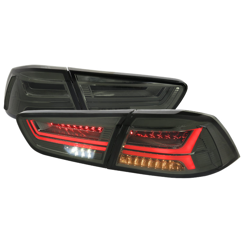 229.95 Spec-D Tail Lights Mitsubishi Lancer EVO 10/X (08-15) Sequential Red/Smoke - Redline360