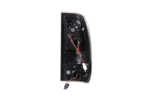 Load image into Gallery viewer, Winjet LED Tail Lights Ford F150 (97-03) Black/Clear / Glossy Black/Clear / Black/Smoke - Black/Clear Alternate Image