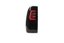 Load image into Gallery viewer, Winjet LED Tail Lights Ford F150 (97-03) Black/Clear / Glossy Black/Clear / Black/Smoke - Black/Clear Alternate Image