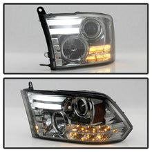 Load image into Gallery viewer, Spyder Projector Headlights Dodge Ram 1500 (09-18) 2500/3500 (10-19) CCFL Halo / LED Halo / Light Bar DRL / V2 Light Bar DRL / V2 Switch Back - with CCFL Halo - Black Smoke Alternate Image