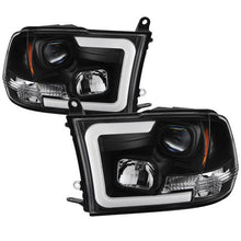 Load image into Gallery viewer, Spyder Projector Headlights Dodge Ram 1500 (09-18) 2500/3500 (10-19) CCFL Halo / LED Halo / Light Bar DRL / V2 Light Bar DRL / V2 Switch Back - Version 2 with Light Bar DRL - Black Alternate Image