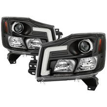 Load image into Gallery viewer, 316.94 Spyder Projector Headlights Nissan Titan (2004-2015) Armada (2004-2007) with CCFL Halo / Version 2 Style / LED Halo - Redline360 Alternate Image