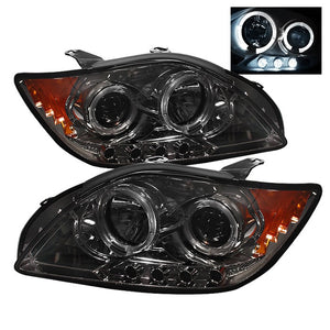 218.34 Spyder Projector Headlights Scion tC (05-06-07) with LED Halo - Black / Smoke - Redline360