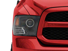 Load image into Gallery viewer, Raxiom Projector Headlights Dodge Ram 1500 Factory Halogen (09-18) Black Housing/ Clear Lens - Super White LED Halo Alternate Image