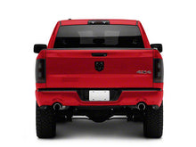 Load image into Gallery viewer, Raxiom Tail Lights Dodge Ram 1500 (09-18) [w/ Factory Halogen Lights] Black Housing / Smoked Lens Alternate Image