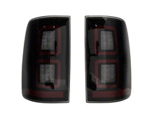 Load image into Gallery viewer, Raxiom Tail Lights Dodge Ram 1500 (09-18) [w/ Factory Halogen Lights] Black Housing / Smoked Lens Alternate Image