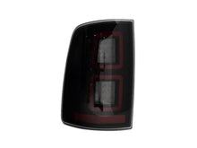 Load image into Gallery viewer, Raxiom Tail Lights Dodge Ram 1500 (09-18) [w/ Factory Halogen Lights] Black Housing / Smoked Lens Alternate Image
