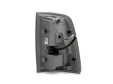 Load image into Gallery viewer, Raxiom Tail Lights Dodge Ram 1500 (09-18) [w/ Factory Halogen Lights] Black Housing / Smoked Lens Alternate Image