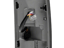 Load image into Gallery viewer, Raxiom Tail Lights Dodge Ram 1500 (09-18) [w/ Factory Halogen Lights] Black Housing / Smoked Lens Alternate Image