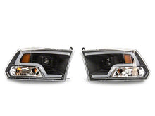 Load image into Gallery viewer, Raxiom Projector Headlights Dodge Ram 1500 Factory Halogen (09-18) Black Housing/ Clear Lens - LED Halo Alternate Image