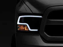 Load image into Gallery viewer, Raxiom Projector Headlights Dodge Ram 1500 Factory Halogen (09-18) Black Housing/ Clear Lens - Super White LED Halo Alternate Image