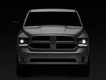 Load image into Gallery viewer, Raxiom Projector Headlights Dodge Ram 1500 Factory Halogen (09-18) [OE-Style] w/ LED Halo &amp; Switchback Turn Signals Alternate Image