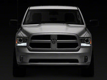 Load image into Gallery viewer, Raxiom Projector Headlights Dodge Ram 1500 Factory Halogen (09-18) [OE-Style] w/ LED Halo &amp; Switchback Turn Signals Alternate Image