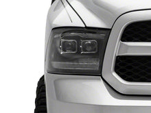 Load image into Gallery viewer, Raxiom Projector Headlights Dodge Ram 1500 Factory Halogen (09-18) Black Housing/ Clear Lens - Super White LED Halo Alternate Image