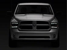 Load image into Gallery viewer, Raxiom Projector Headlights Dodge Ram 1500 Factory Halogen (09-18) Black Housing/ Clear Lens - Super White LED Halo Alternate Image