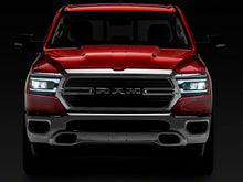 Load image into Gallery viewer, Raxiom Projector Headlights Dodge Ram 1500 w/ Factory Halogen (19-23) [LED DRL] Black Housing/ Clear Lens Alternate Image