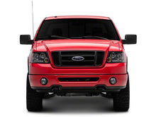 Load image into Gallery viewer, Raxiom Projector Headlights Ford F150 (04-08) [Dual LED Halo DRL] Black Housing/ Clear Lens - Default Title Alternate Image