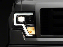 Load image into Gallery viewer, Raxiom Projector Headlights Ford F150 Factory Halogen (09-14) Black Housing/ Clear Lens Alternate Image