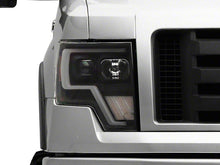 Load image into Gallery viewer, Raxiom Projector Headlights Ford F150 Factory Halogen (09-14) Black Housing/ Clear Lens Alternate Image