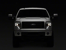 Load image into Gallery viewer, Raxiom Projector Headlights Ford F150 Factory Halogen (09-14) Black Housing/ Clear Lens Alternate Image