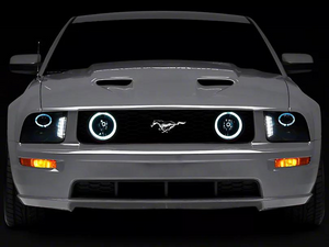 Raxiom Projector Headlights Ford Mustang S197 w/ Factory Halogen (05-09) Black Housing/ Clear or Smoked Lens