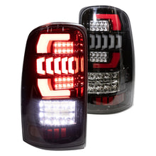 Load image into Gallery viewer, Winjet LED Tail Lights Chevy Suburban (00-06) Black/Smoke or Glossy Black/Clear - Glossy Black / Clear Alternate Image