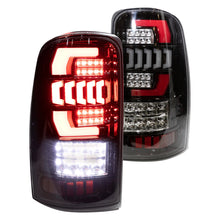 Load image into Gallery viewer, Winjet LED Tail Lights Chevy Tahoe (00-06) Black/Smoke or Glossy Black/Clear - Glossy Black / Clear Alternate Image