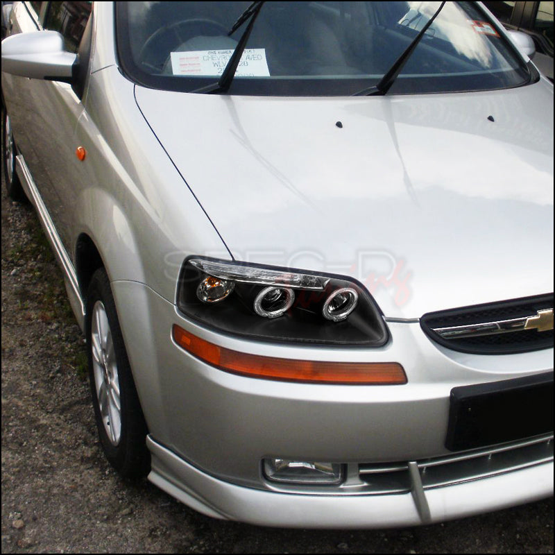 Spec-D Dual Halo Projector Headlights (Matte Black Housing/Clear Lens) Chevrolet Aveo 2004-2008 | 2LHP-AVE045JM-TM Spec-D Dual Halo Projector Headlights (Matte Black Housing/Clear Lens) Chevrolet Aveo 2004-2008 | 2LHP-AVE045JM-TM