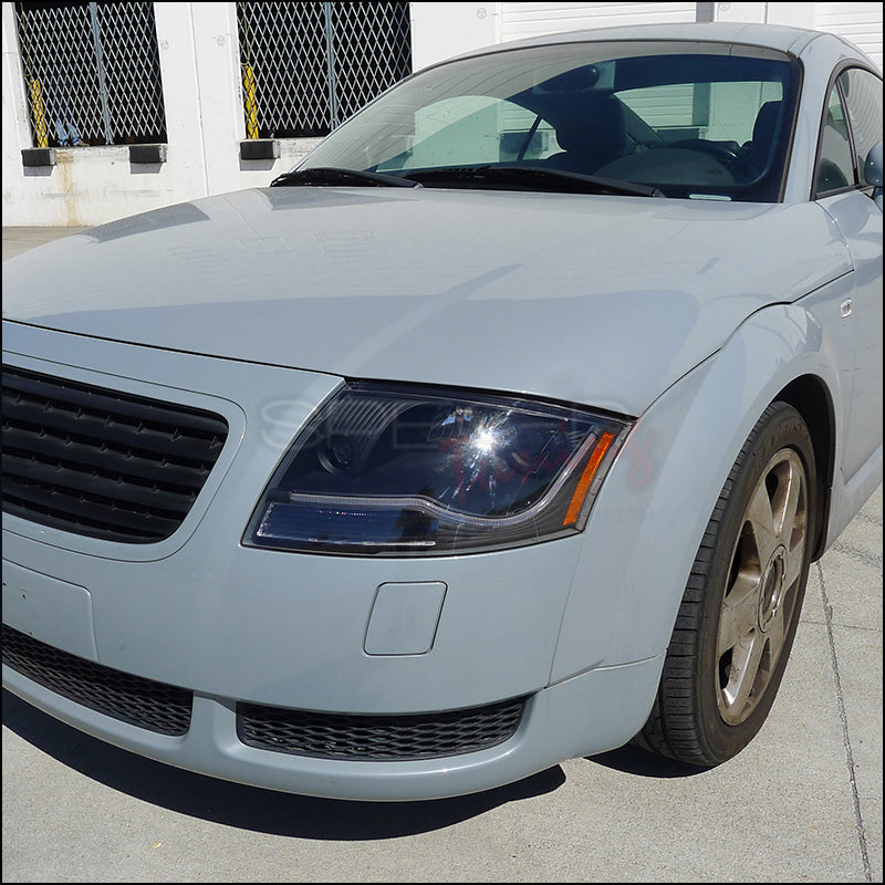thumbnail image 2 of LED Strip Bar Smoke Projector Headlights For Audi TT 99-06 - Pair Left+Right, Chrome Housing, H1 Bulbs Included, DOT/SAE 2 of 5