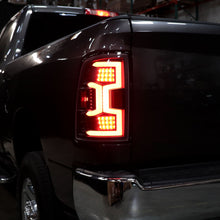 Load image into Gallery viewer, Spec-D Tail Lights Ram 2500 3500 (19-22) Sequential w/ LED Light Bar - Black / Tinted Alternate Image