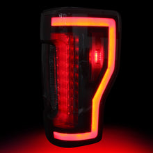 Load image into Gallery viewer, Winjet Renegade LED Tail Lights Ford F250 F350 F450 (17-19) w/ LED Lightbars &amp; Sequential Turn Signals - Black / Clear Alternate Image
