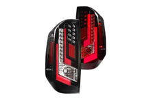 Load image into Gallery viewer, Winjet Renegade LED Tail Lights Toyota Tundra (14-20) Gloss Back / Clear &amp; Red Glow Bar - Default Title Alternate Image