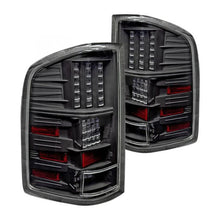 Load image into Gallery viewer, Winjet LED Tail Lights Chevy Silverado 1500 (07-13) 2500 &amp; 3500 (08-14) Smoke / Clear / Red Lens CTWJ-0067 - Gloss Black / Clear Lens Alternate Image